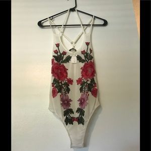 One piece white mesh body suit